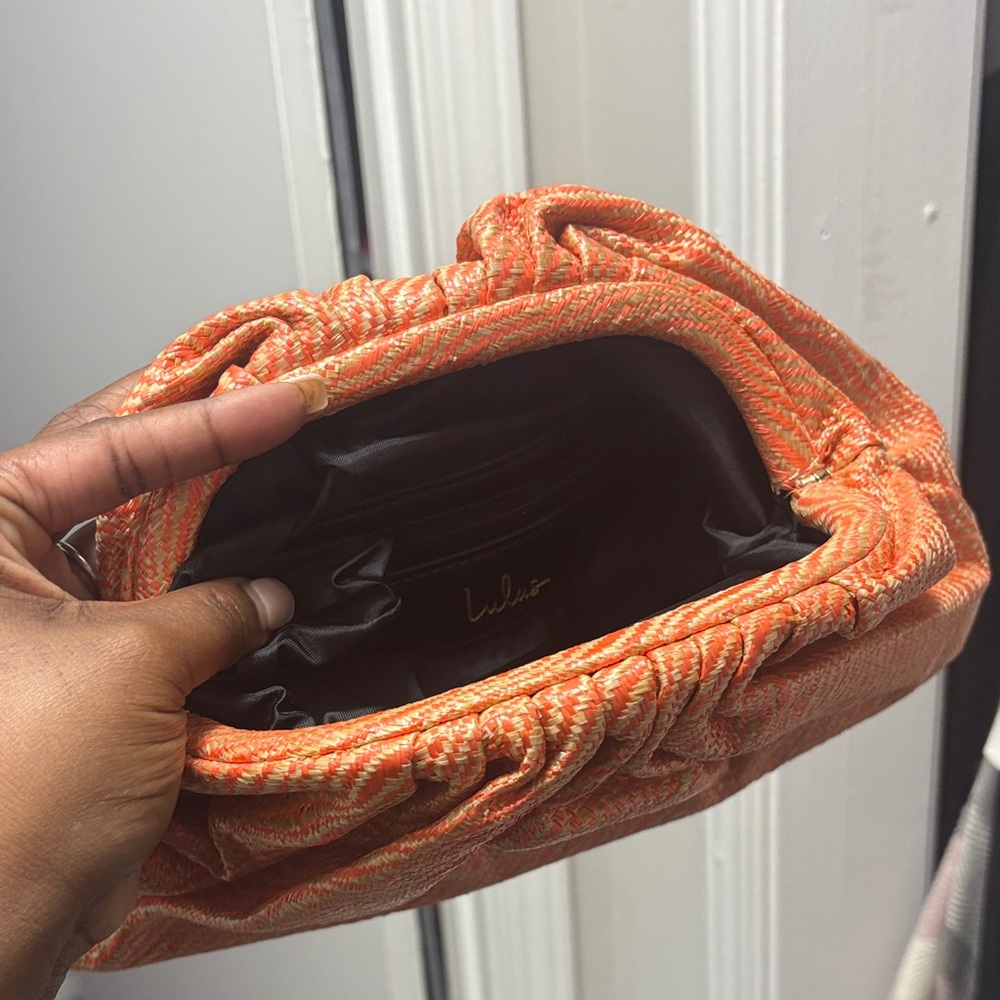 Lulu's Vibrant Orange Clutch